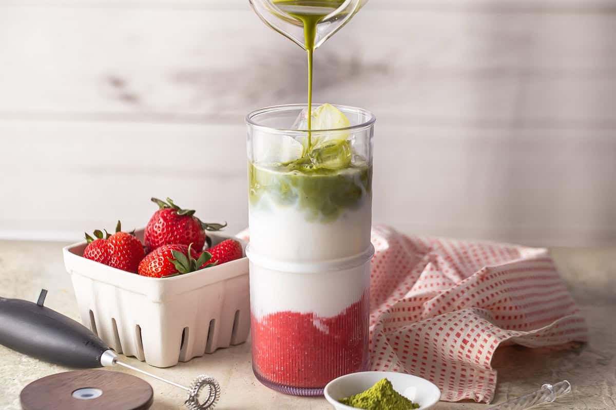 layering the matcha into the iced matcha latte