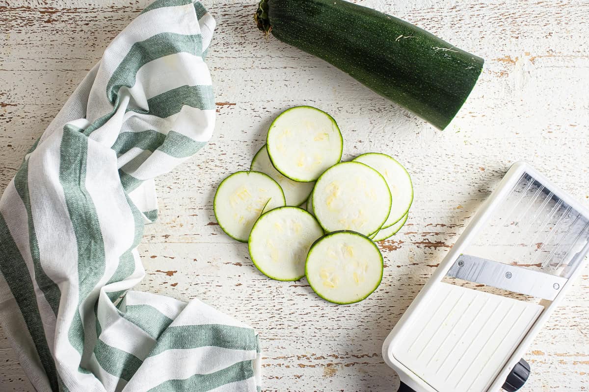 Slicing vegetables for ratatouille with a mandoline.