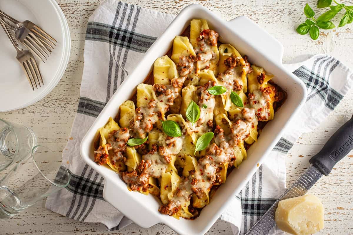 Finished stuffed shells recipe with fresh basil on top