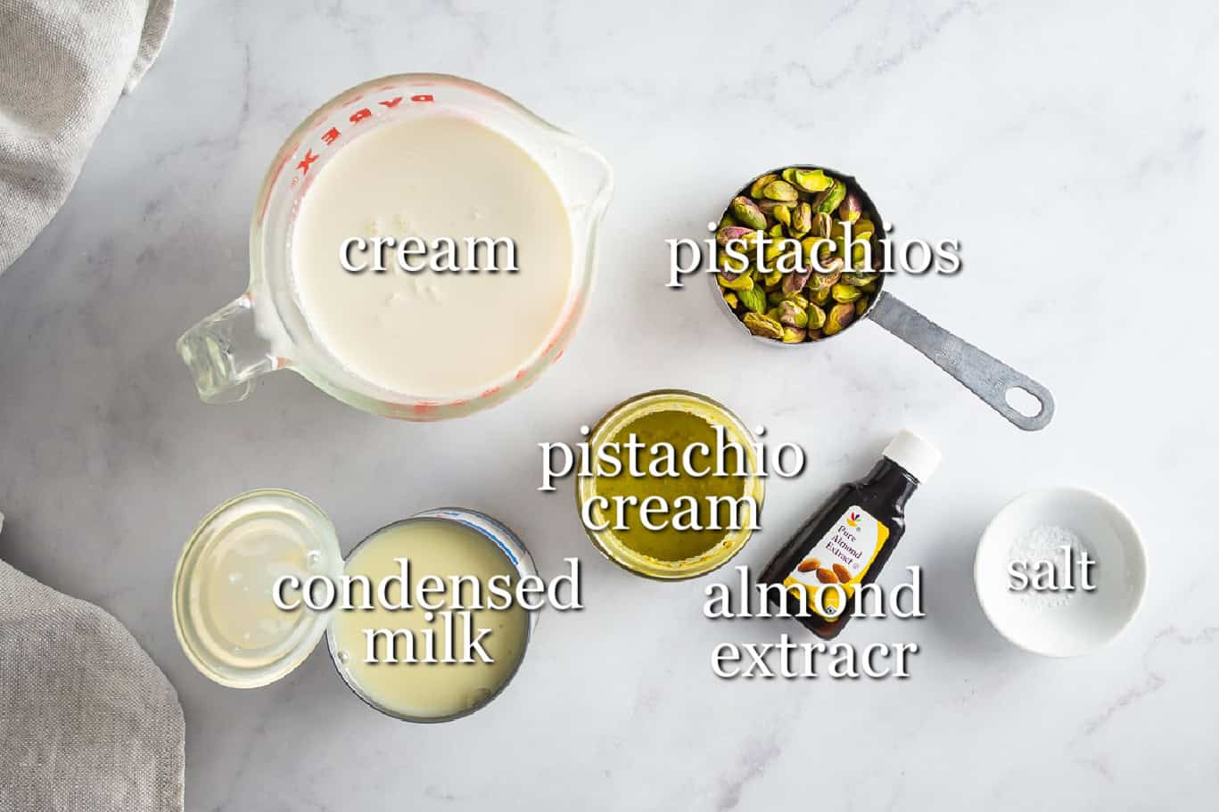 Ingredients for pistachio ice cream in separate containers.