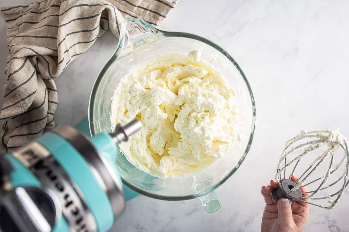 Sweetened cream after being whipped to stiff peaks.