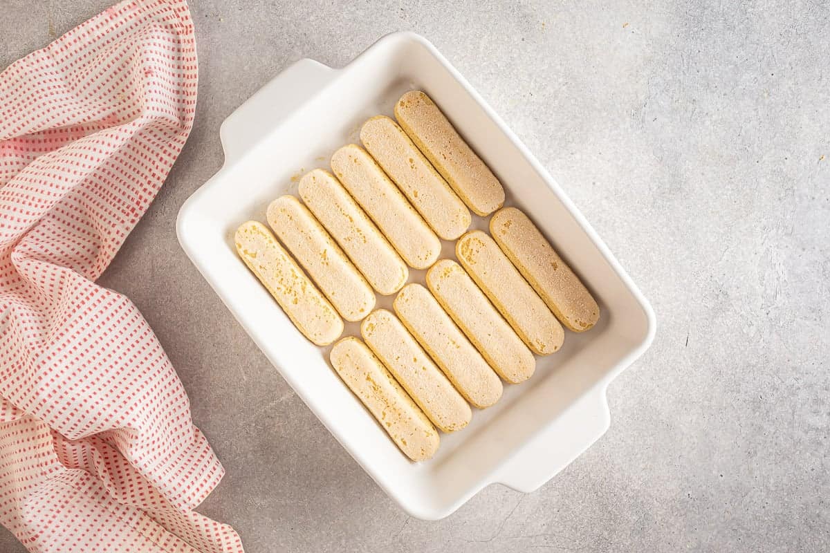 Ladyfingers in the bottom of a dish.