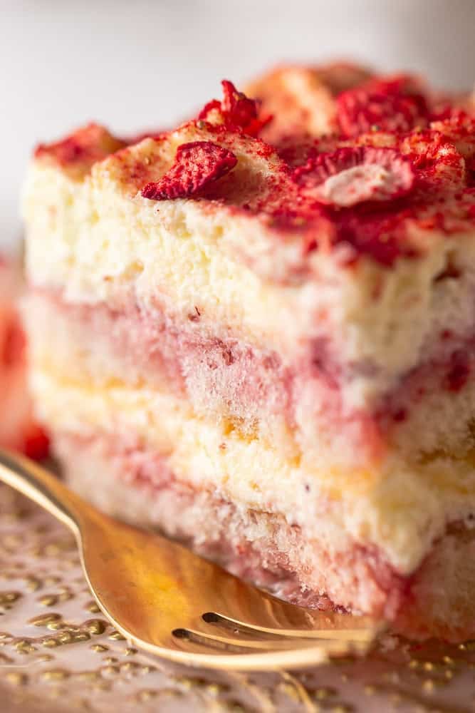 Close-up shot of a slice of strawberry tiramisu.