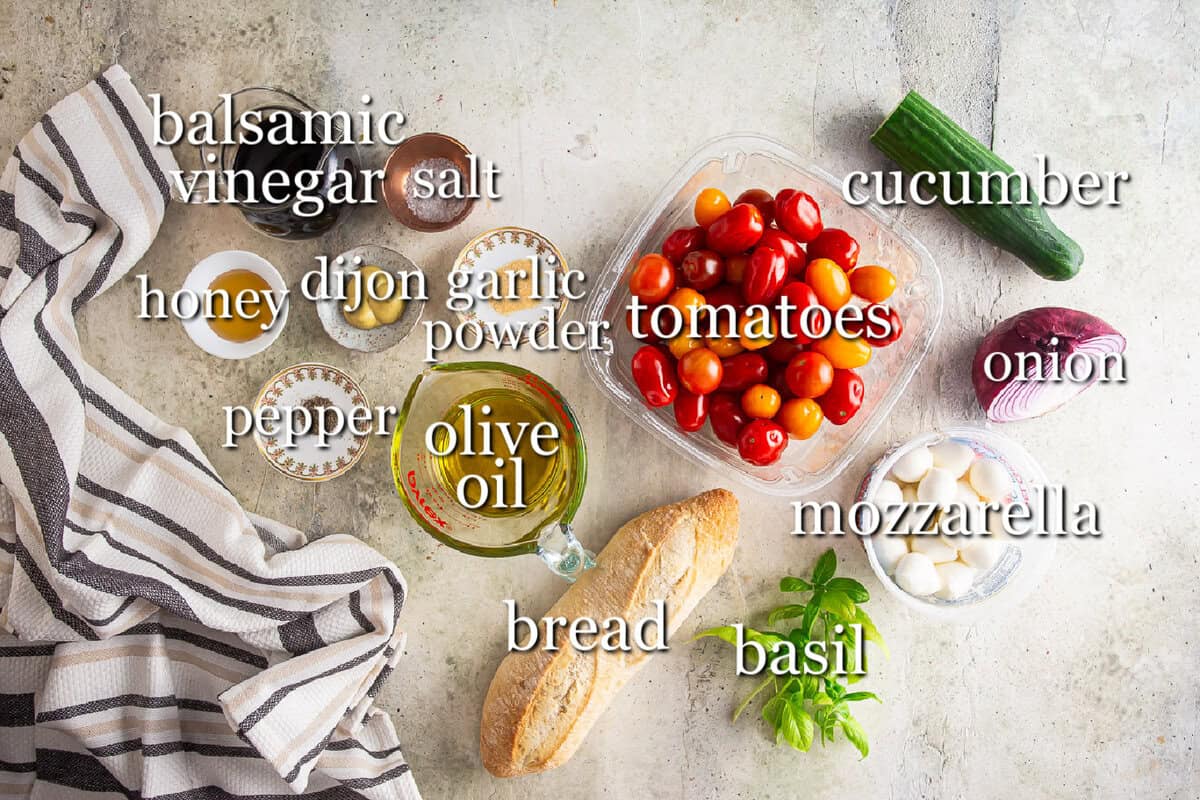 Ingredients for panzanella in separate containers