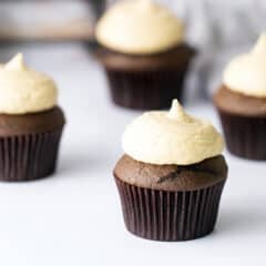 Peanut butter frosting on chocolate cupcakes