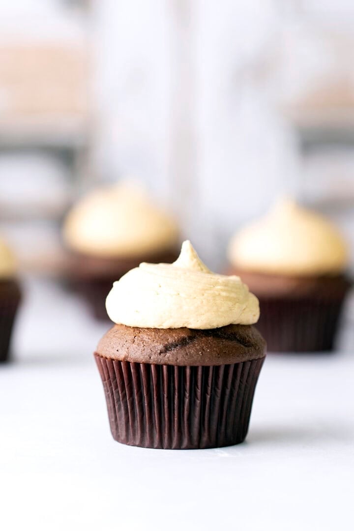 Peanut butter frosting on chocolate cupcakes