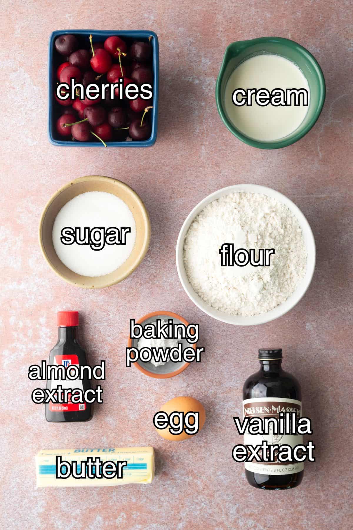 Recipe ingredients for cherry scones in separate containers.