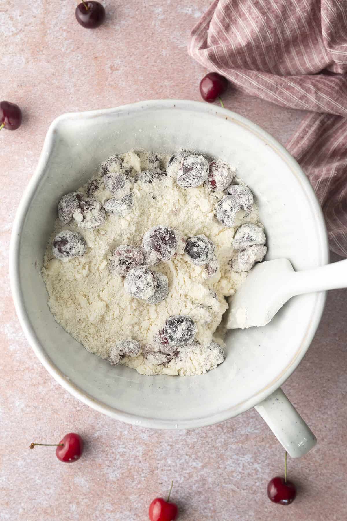 Cherries added to dry ingredients for cherry scones