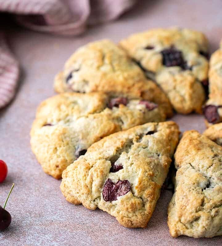 Cherry scones on a pink surface
