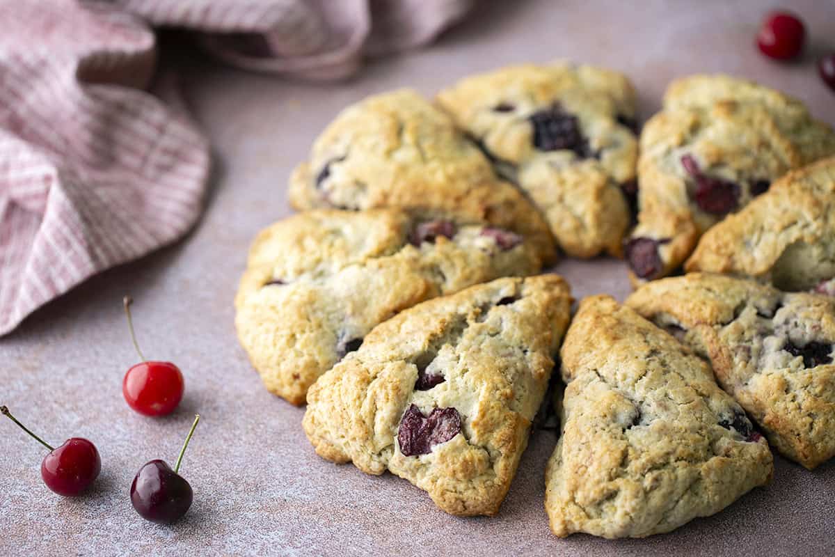 Cherry scones on a pink surface