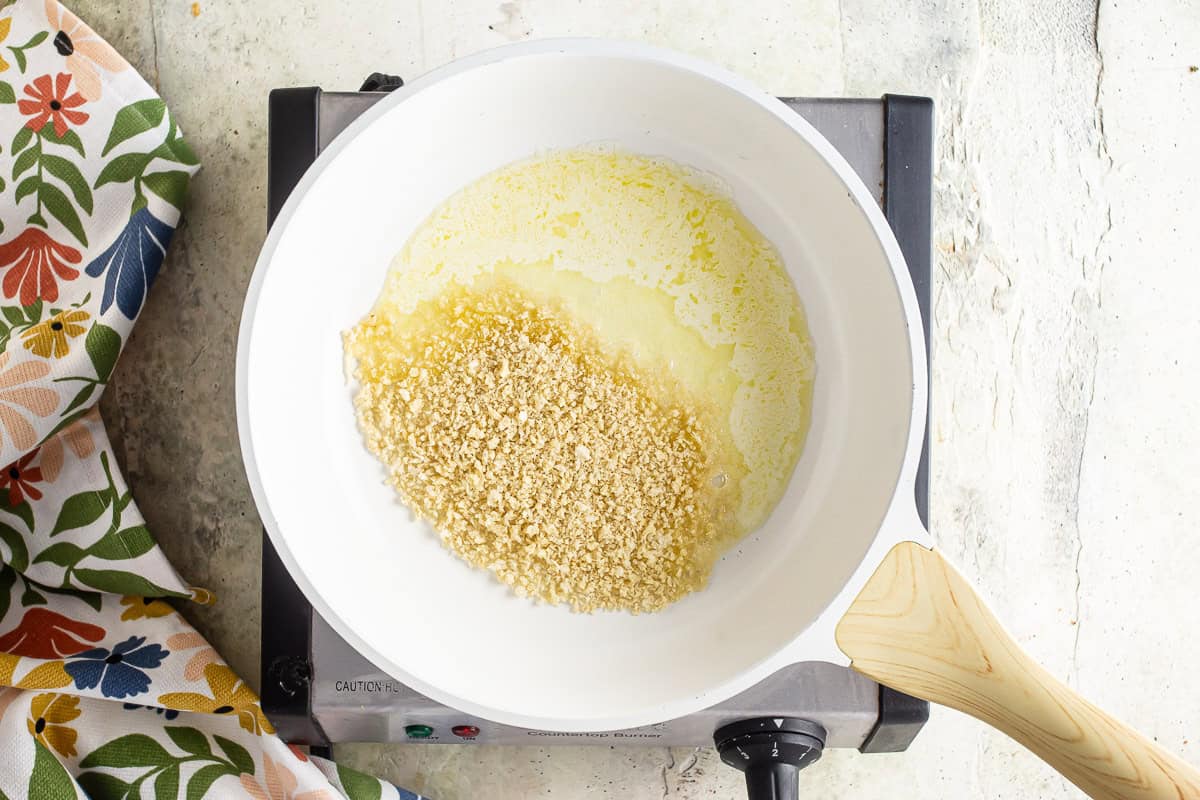 Butter and breadcrumbs in a pan for clam sauce