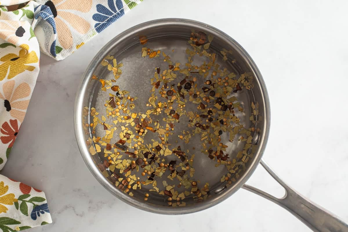 Making brine for homemade dill pickles.