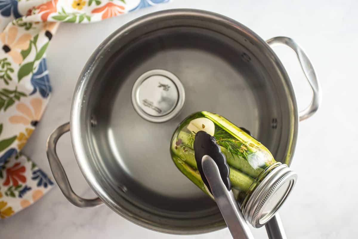 Water bath canning homemade dill pickles.