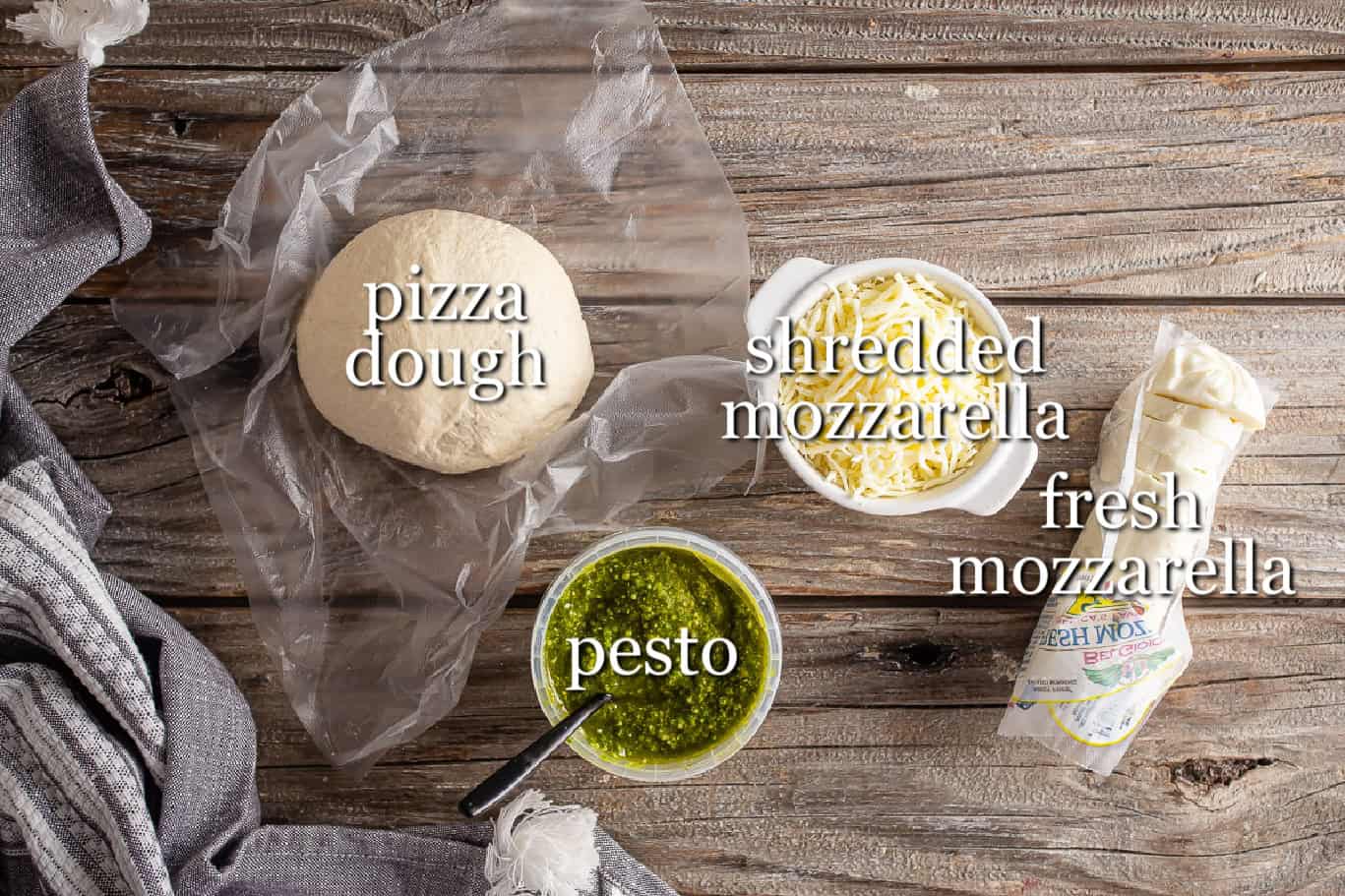 Ingredients for pesto pizza in separate containers