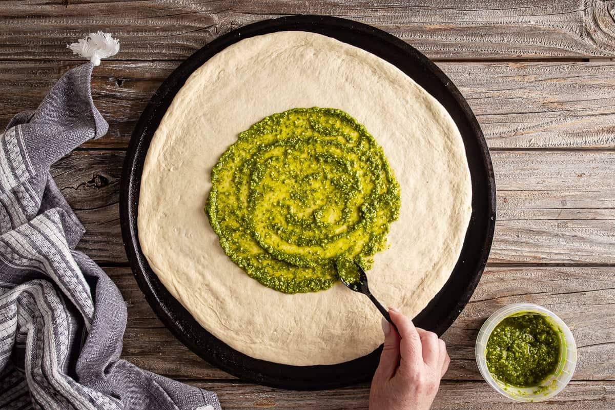 Adding pesto to pizza crust