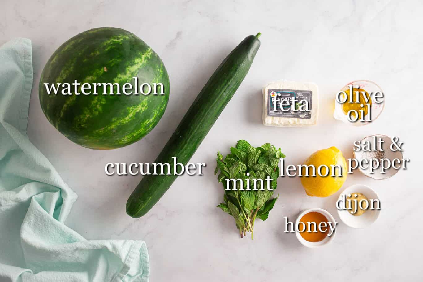 Ingredients for watermelon mint feta salad before being prepped and combined.