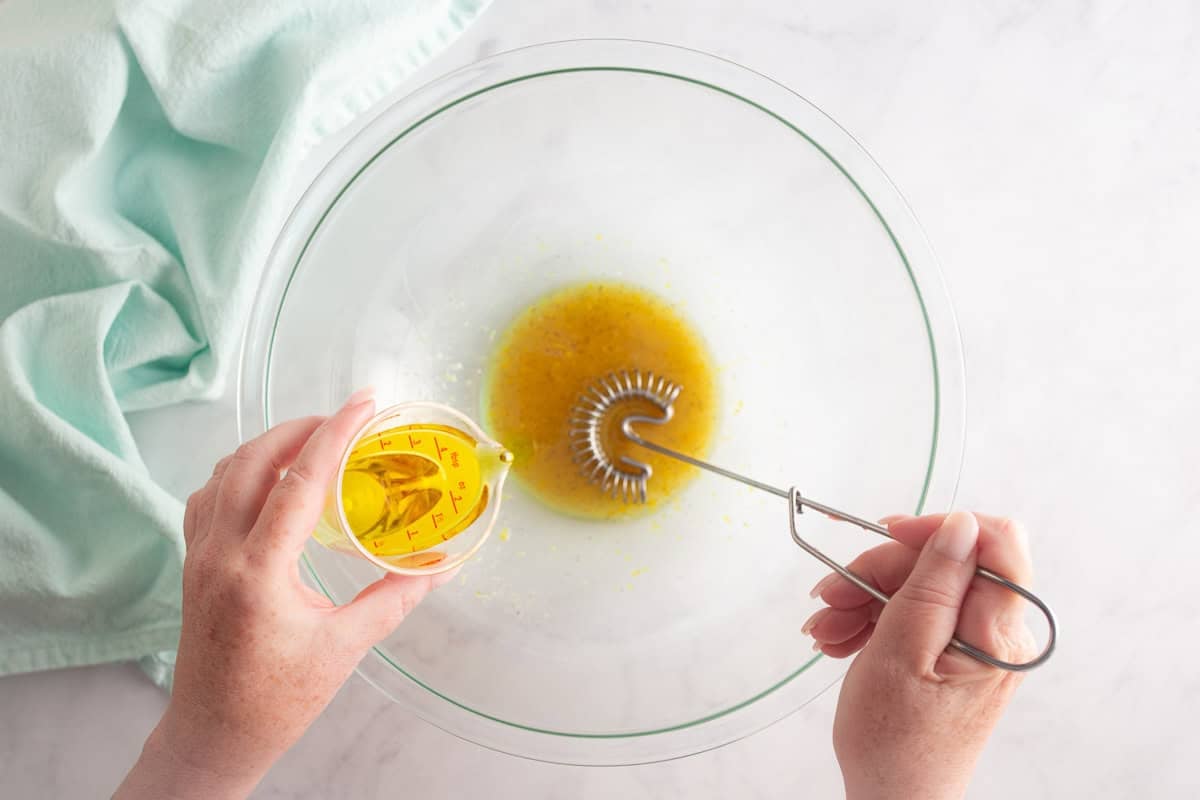 Whisking dressing together for watermelon salad.