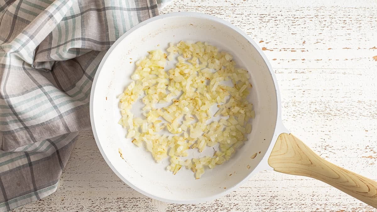 Sweating onions in a skillet for crab cakes