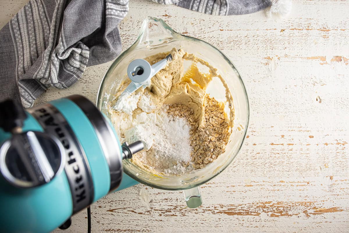 Adding flour to the cowboy cookie dough