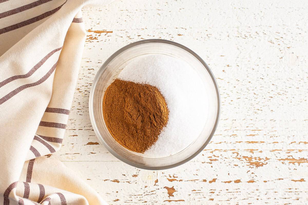 Cinnamon and sugar in a bowl before being combined