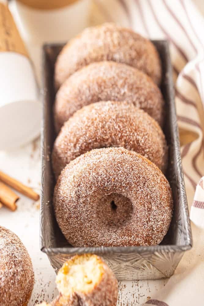Baked cinnamon sugar donuts in a pan