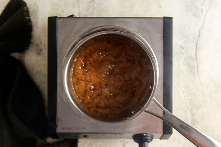 Toffee after it is brought to a boil before being poured into the tray