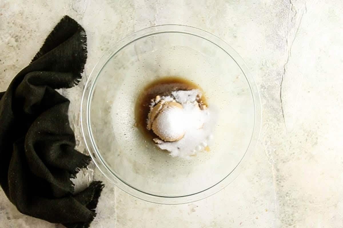 Adding sugars to the browned butter for brown butter toffee chocolate chip cookies