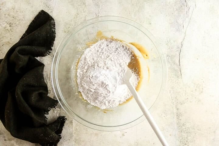 Adding dry ingredients to the cookie dough