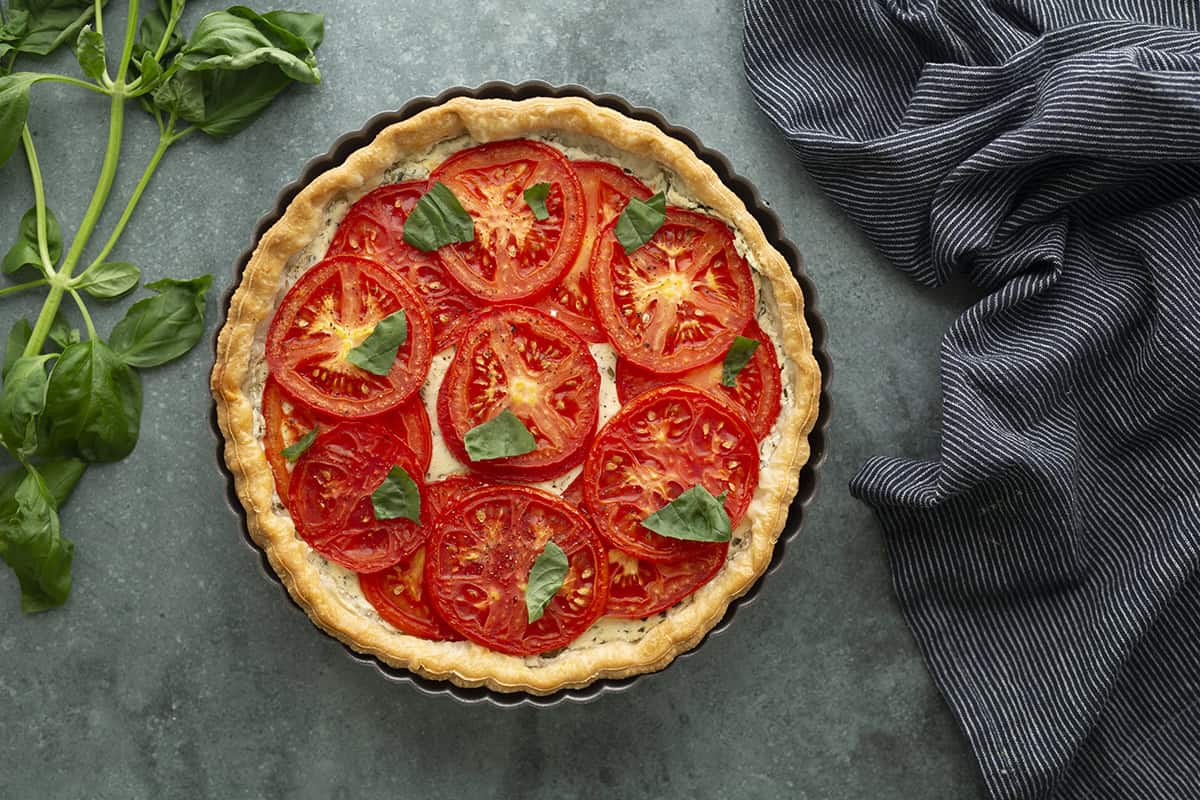 Tomato tart topped with basil
