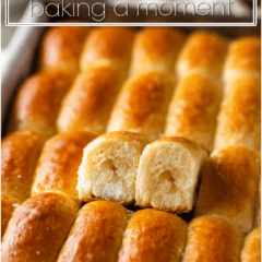 Freshly baked Parker House rolls with golden crust and soft interior.